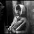 Stojan Kerbler, A girl with bread, 1970 BW photograph